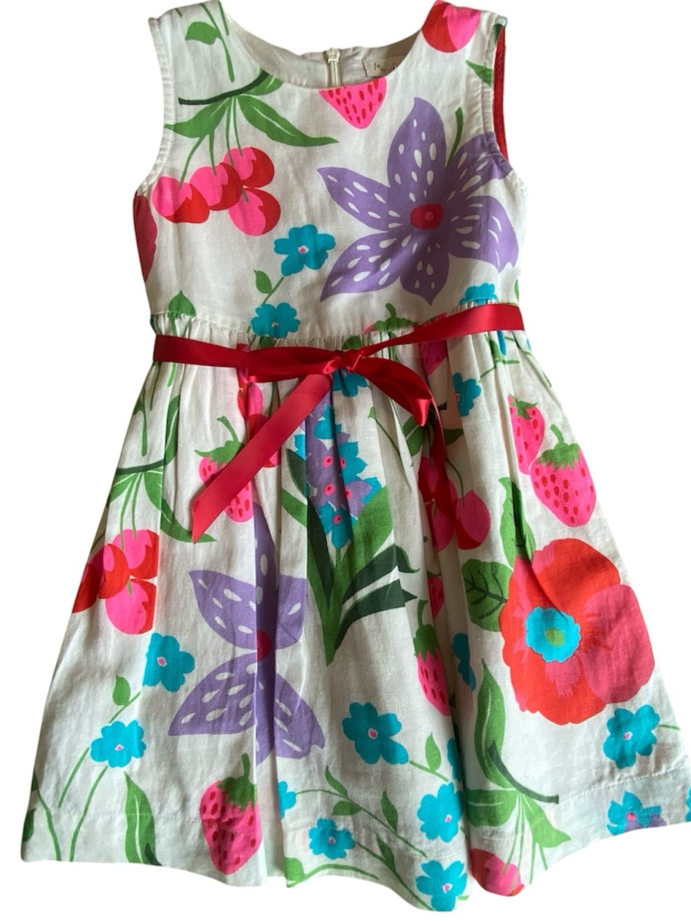 Mini Boden white sundress featuring a vibrant floral and fruit pattern, 3-4